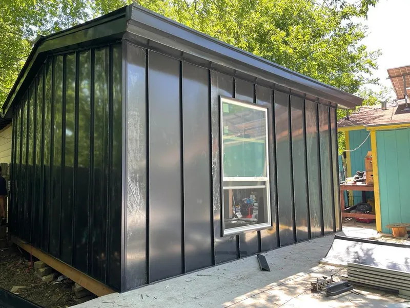 Black standing seam metal wall panels for Metal Roof Installation in Lafayette