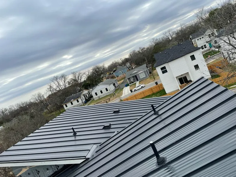 Standing seam metal roof panels with vents for Skylight Repair in Lafayette